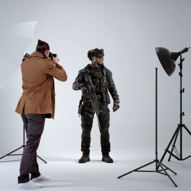 istock Professional Photographer Captures Soldier in a Studio Photoshoot 2182006863