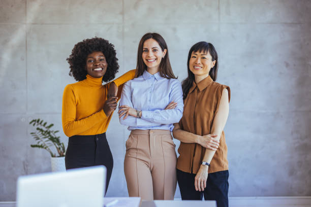 istock Confident Businesswomen Posing in Modern Office Setting 2182007447