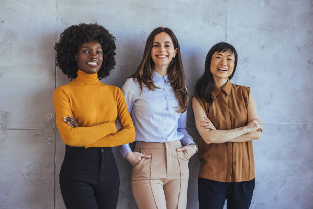 istock Confident Women Standing Together in Casual Office Attire 2182007461