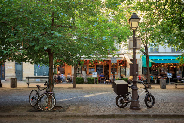 istock Paris street sidewalk cafe 2182010500