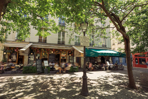 istock Paris street sidewalk cafe 2182010516