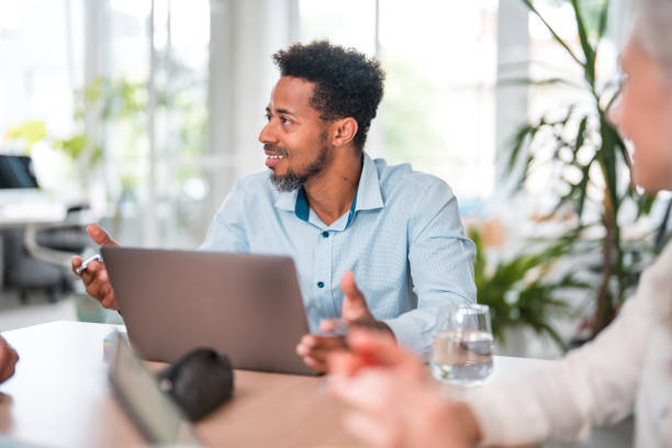 istock Dedicated Black Executive in Business Discussion 2182012482