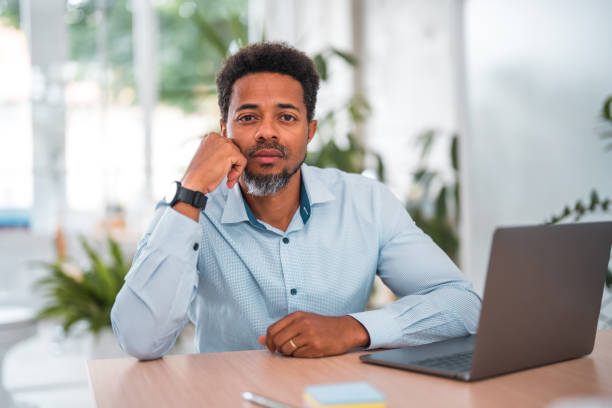 istock Successful Black Businessman Working at Office Table 2182012499