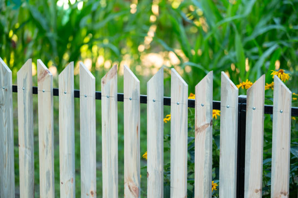 istock New wooden fence with metal frame 2182024276