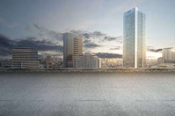 Empty rooftop balcony with view of modern building skyscrapers and futuristic architecture with sunset scene. Mock up or template. copy space. Cityscapes background