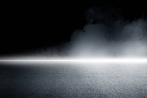istock Surface of black concrete floor. Abstract texture with mist or fog 2182030684