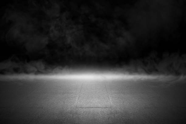 istock Surface of black concrete floor. Abstract texture with mist or fog 2182030713