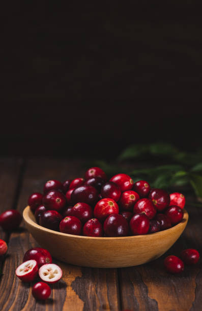 Cranberry berries in a wooden plate