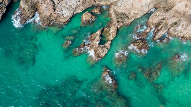istock Rocky coastline cliffs, sea water surface aerial view with copy space. 2182036203