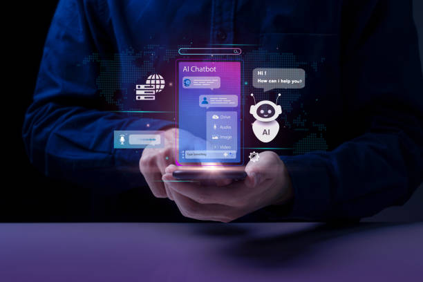 istock AI chatbot, artificial intelligence. A person uses a smartphone with a holographic AI chatbot interface. assistant chatbot. LLM AI deep learning. modern technology and digital communication. 2182038054