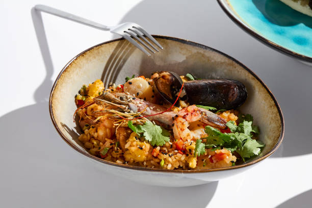 istock Vibrant Seafood Fried Rice with Natural Lighting and Bold Colors 2182038543