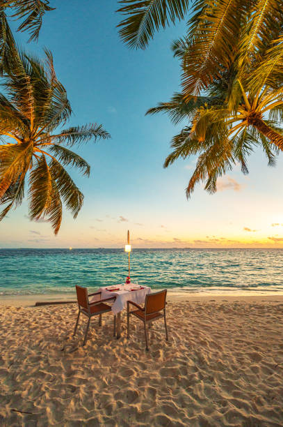 istock Romantic sunset dinner on the tropical paradise beach 2182041360