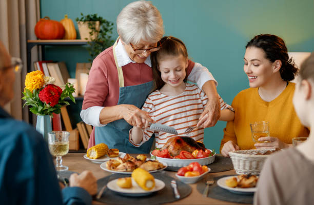 istock Family celebrating Thanksgiving Day 2182042406