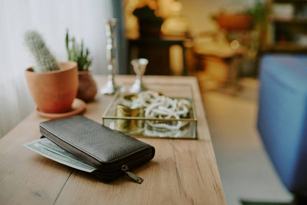 istock Leather Wallet on Wooden Dresser 2182042455
