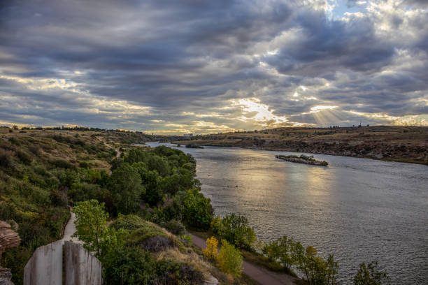 View of the Missouri river at sunset from Giant Falls State Park in Great Falls, Montana