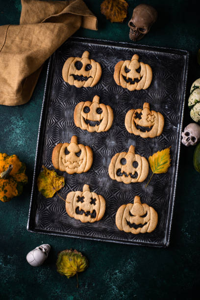 istock Halloween cookies in shape of jack-o-lantern 2182043715