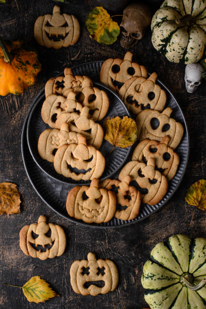 istock Halloween cookies in shape of jack-o-lantern 2182043721