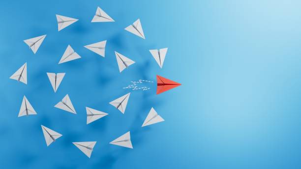 istock Different business concept.Red paper plane changing direction from white paper plane. new ideas. paper art style. creative idea.3D rendering on blue background. 2182044363