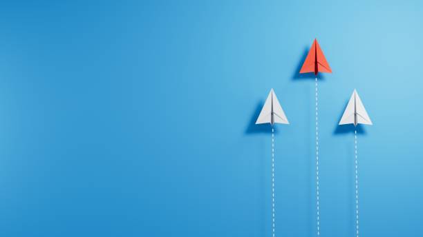 istock Leaderplane concept with red paper plane leading among white on blue background, copy space.new ideas. paper art style. creative idea.3D rendering on blue background. 2182044654