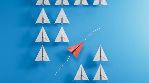 istock Red paper plane floating through others on light blue background, flat lay. Uniqueness concept.new ideas. paper art style. creative idea.3D rendering on blue background. 2182048369