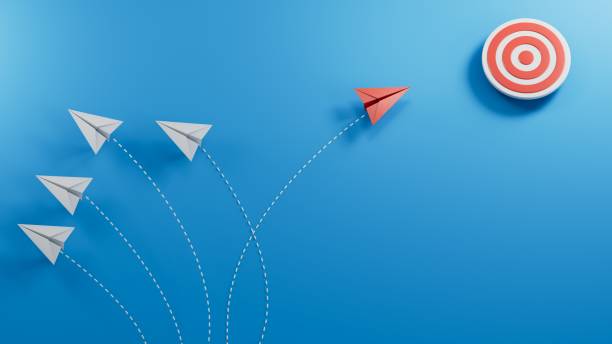 istock Red paper plane change direction from group hitting to target on blue background. Design for business creativity new idea to discovering new business options, Individual and unique leader. paper art. 2182048379