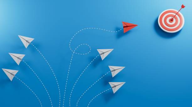 istock Red paper plane change direction from group hitting to target on blue background. Design for business creativity new idea to discovering new business options, Individual and unique leader. paper art. 2182048381