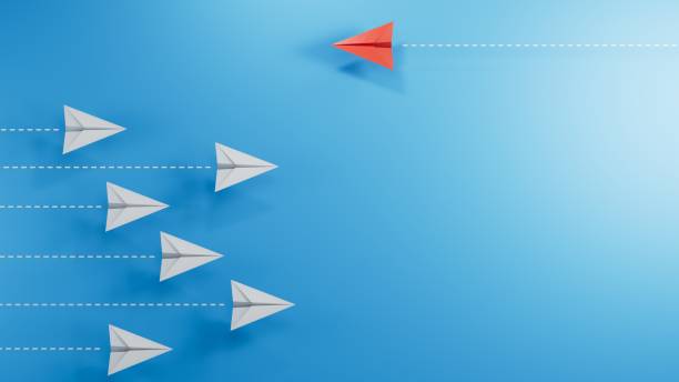 istock Red paper plane flying different way,think different concept.new ideas. paper art style. creative idea.3D rendering on blue background. 2182048964