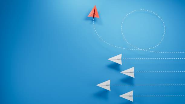 istock Think differently concept. Red paper plane changing direction. 3D illustration.new ideas. paper art style. creative idea.3D rendering on blue background. 2182049162