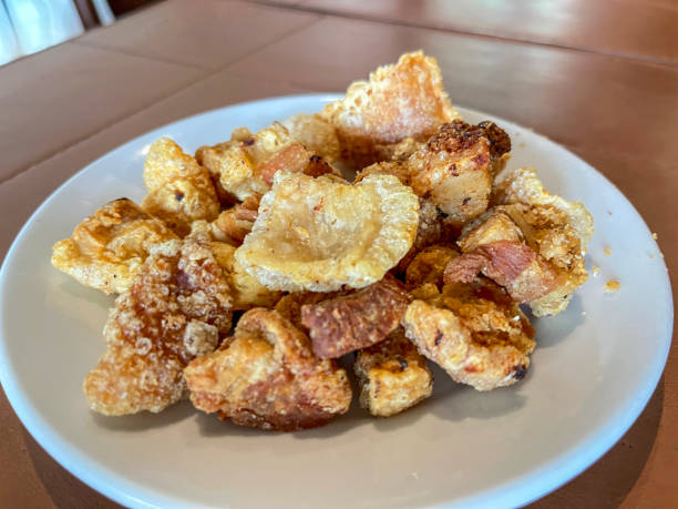 istock Pork crackling pieces on plate 2182052892
