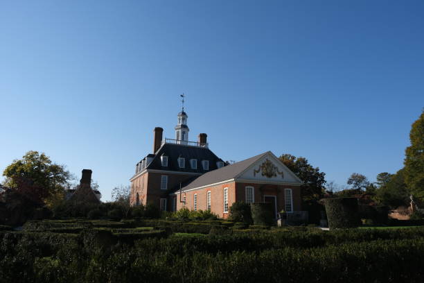 Williamsburg Virginia USA:  10/26/2024:  The Governors Palace in Colonial Williamsburg sits on a sunny day.  The landmark housed several governors including Patrick Henry and Thomas Jefferson.
