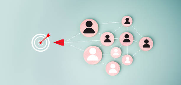 istock Dartboard and red arrow connection linkage with human icon for customer focus target group and customer relation management concept, Target customer, Marketing plan and strategies. 2182057459