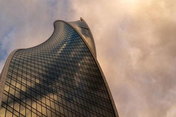 istock Skyscrapers in business district against blue sky. 2182061942