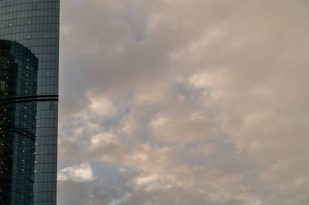 istock Skyscrapers in business district against blue sky. 2182061947