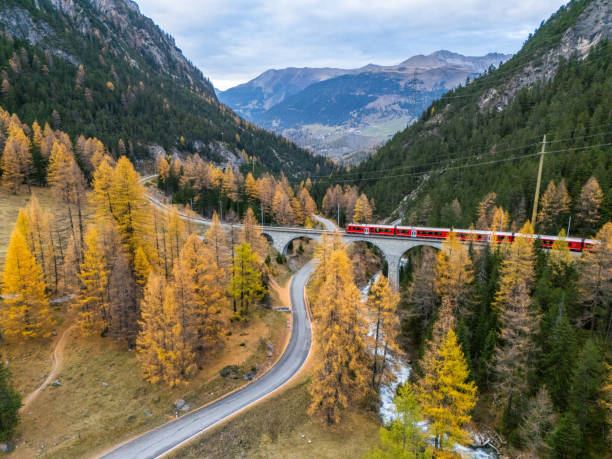 istock Scenic Train Journey Across Alpine Viaduct in Autumn 2182063186