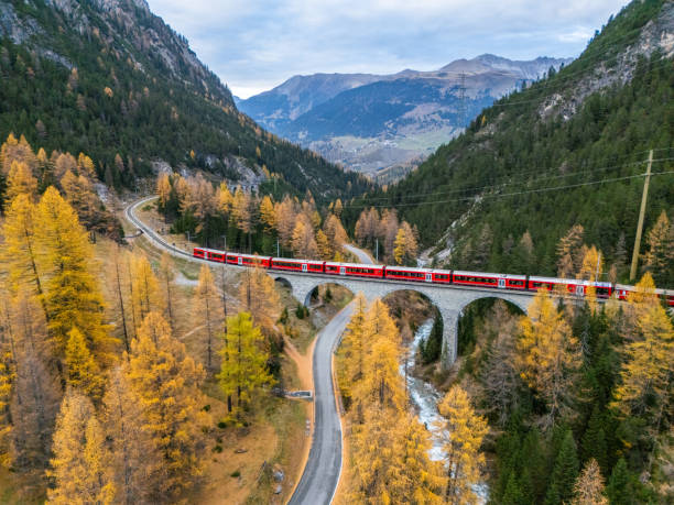 istock Scenic Train Journey Across Alpine Viaduct in Autumn 2182063201