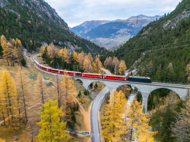 istock Scenic Train Journey Across Alpine Viaduct in Autumn 2182063202