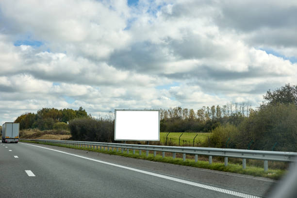 white billboard by the side of the road, mock up