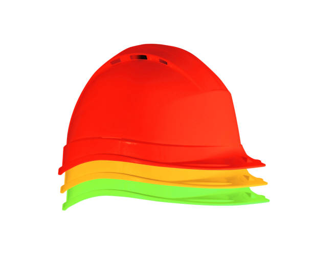 istock Yellow, red, and green safety helmets 2182064358