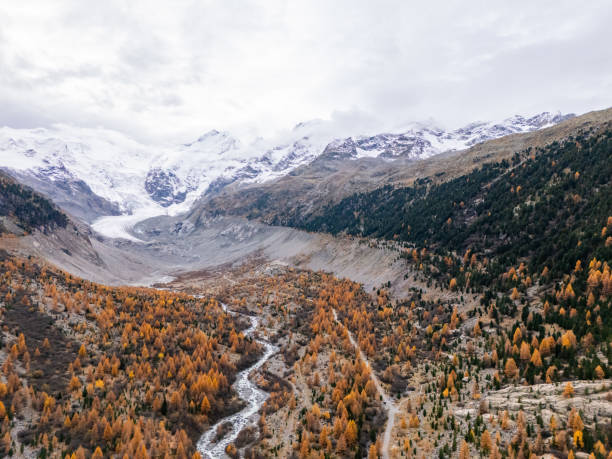 istock Majestic Mountain Valley with Autumn Trees and Glacial View 2182065363