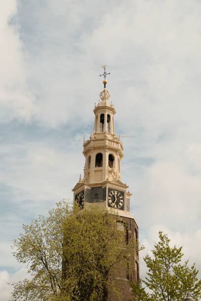 istock Montelbaanstoren Tower under gray cloudy sky  in Amsterdam, Netherlands, vertical shot 2182068975