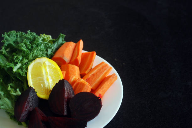 Sliced purple carrot over blue background