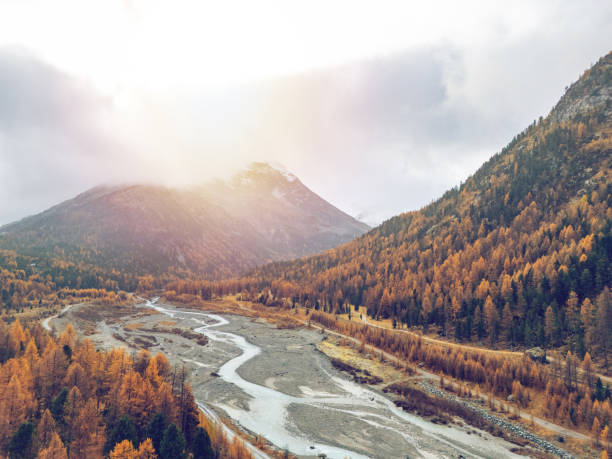 istock Misty Autumn Morning in the Mountain Valley 2182070924