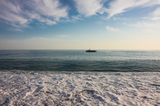 a beautiful ship is sailing in the blue sea