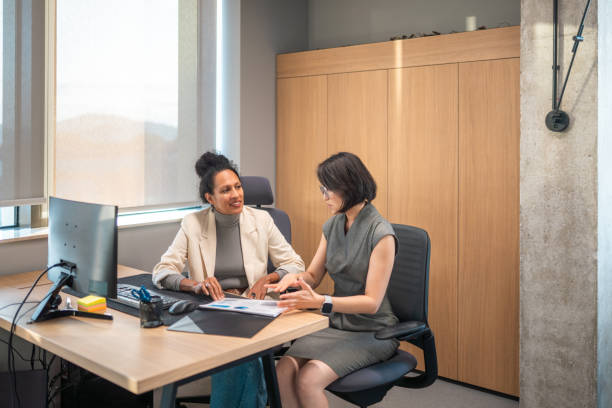 istock Diverse Businesswomen in Team Discussion 2182073067