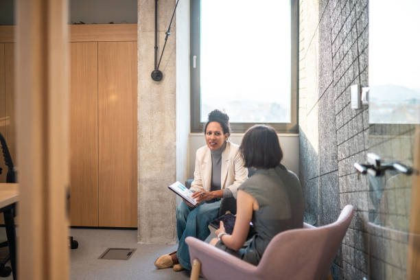 istock Diverse Businesswomen Engage in Office Strategy Session 2182073082