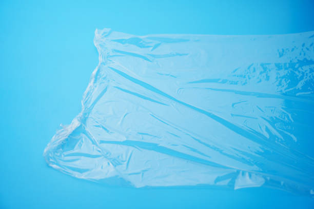 istock Transparent stretch film for packaging on a blue background. 2182074316