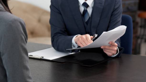 istock The hands of a businessman blaming his subordinate 2182075592