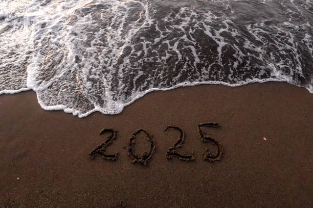 istock Christmas inscription 2025 on the  summer beach 2182079505