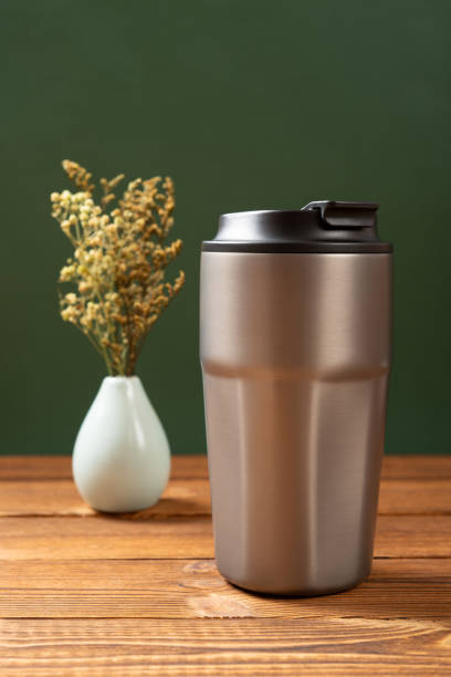 istock a stainless steel thermos cup at vertical composition 2182080088