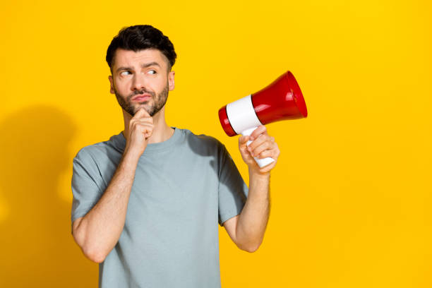 istock Photo of minded concentrated man interested look empty space question answer dilemma decision consider isolated on yellow color background 2182084651